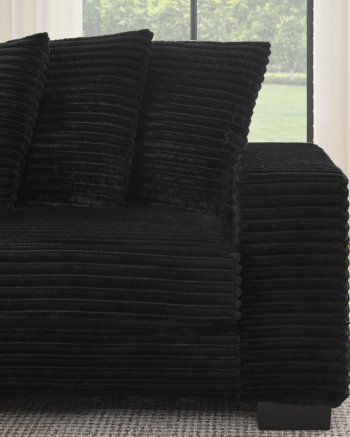 Black Corduroy L-Shaped Sectional with Reversible Chaise, 111 in in Black, chaise shown on the left (reversible), fabric close-up