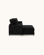 Black Corduroy L-Shaped Sectional with Reversible Chaise, 111 in in Black, chaise shown on the left (reversible), side view [c:black]