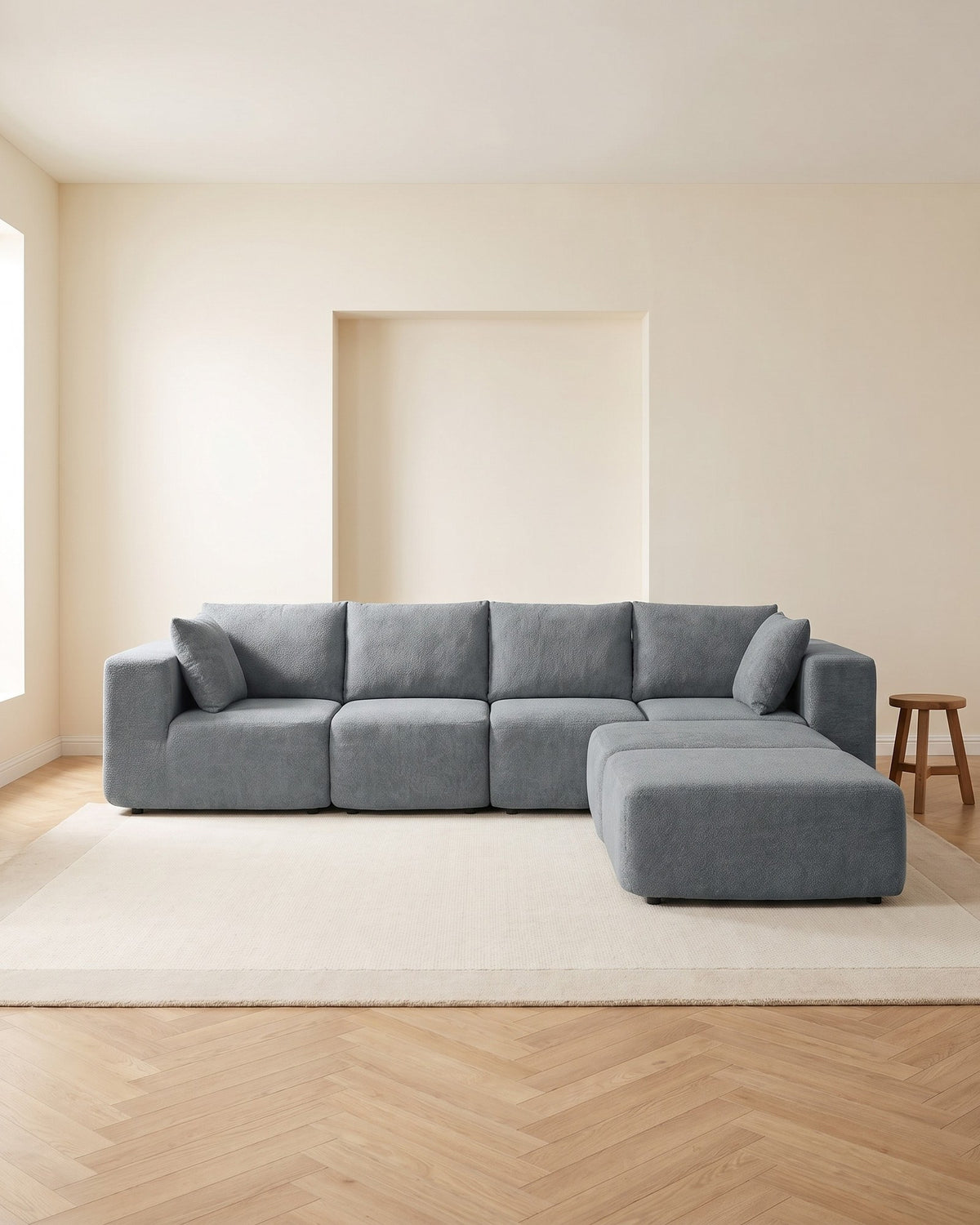 Boneless U-Shaped Sectional with Two Ottomans, 116 in in Dark Grey, styled in a bright living room