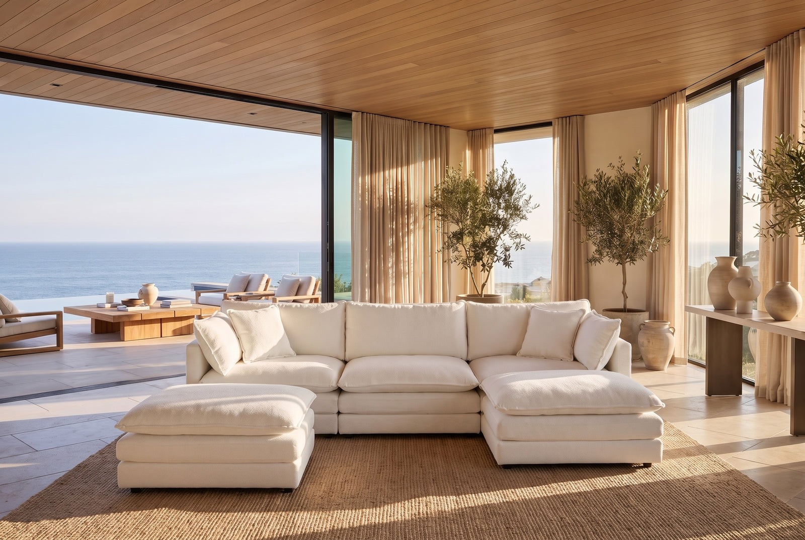The same cream modular sectional arranged as a l-shape