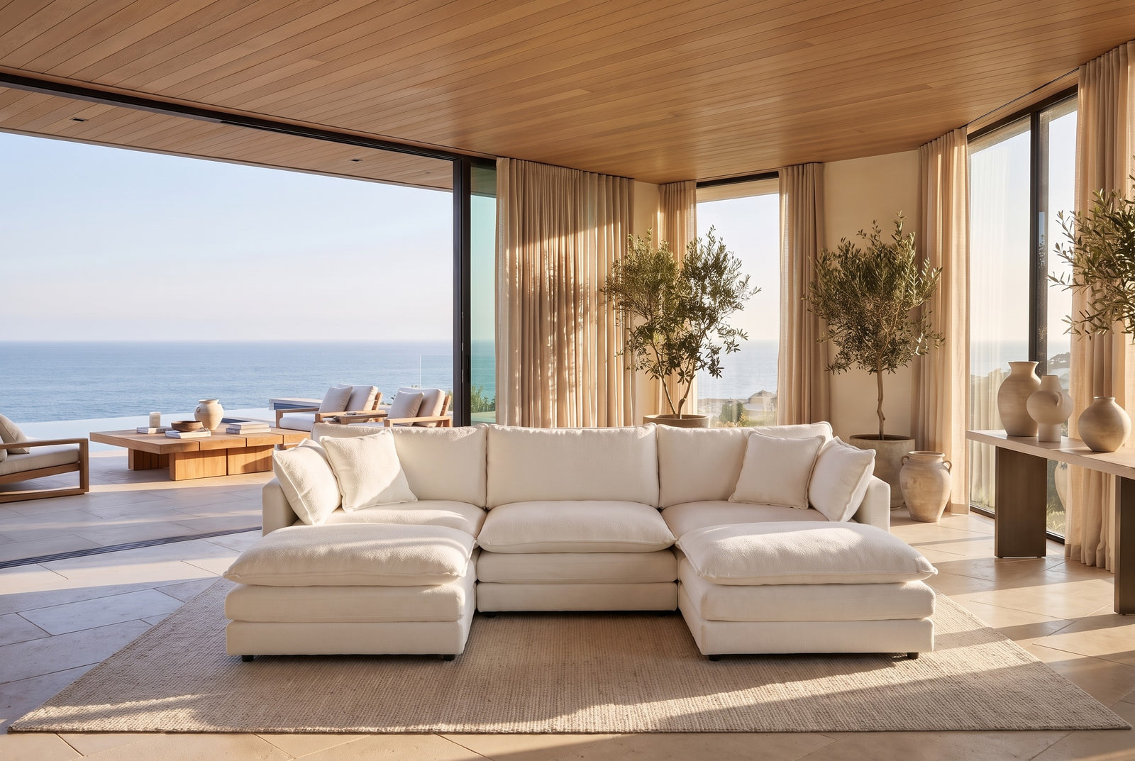 The same cream modular sectional arranged as a lounge