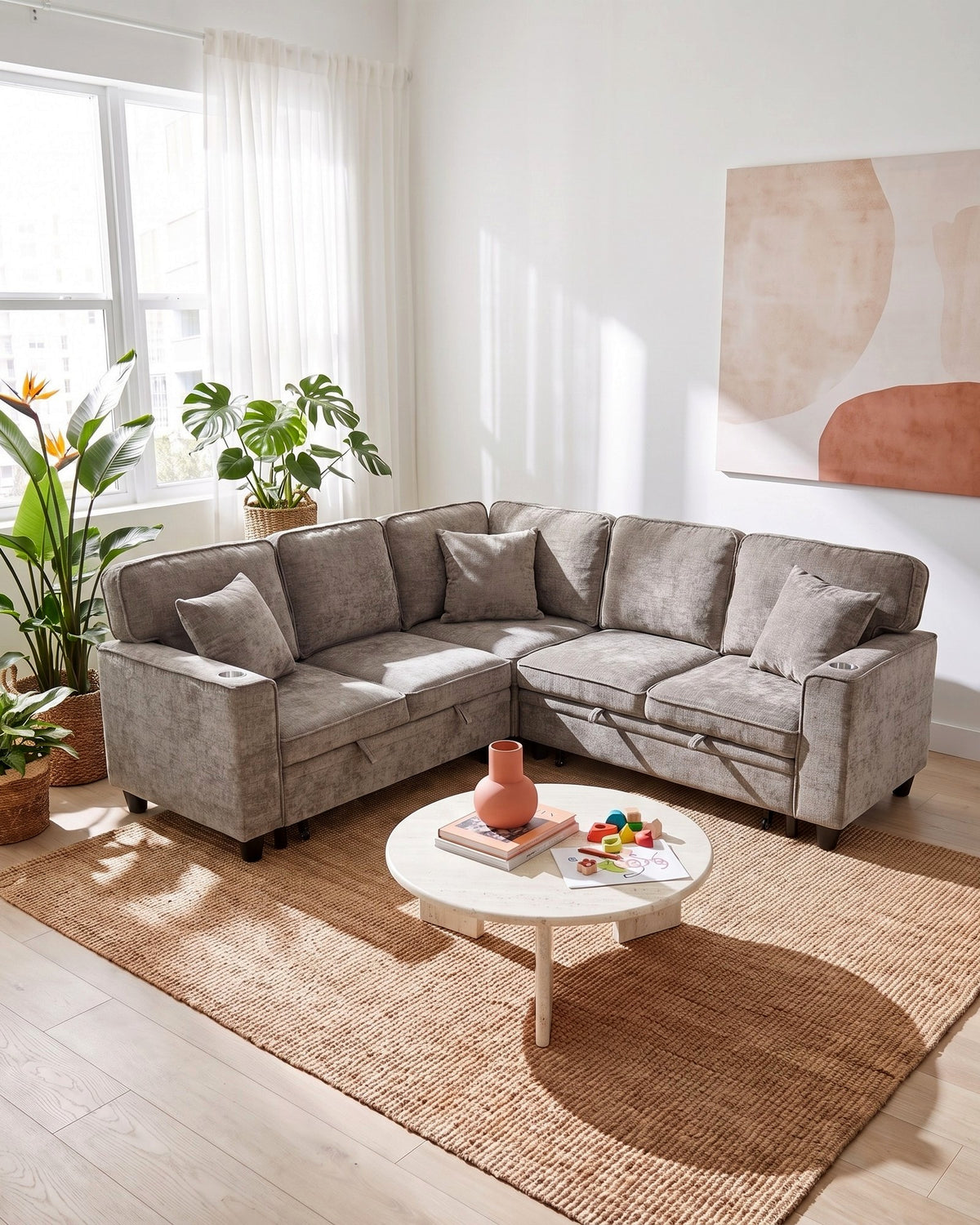 Chenille Sleeper Sectional with Pull-Out Bed and Storage, 81 in in Light Grey, styled in a bright living room