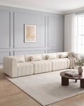 Compressed Modular Sectional, 145 in in Beige, styled in a bright living room [c:beige] [r:good]