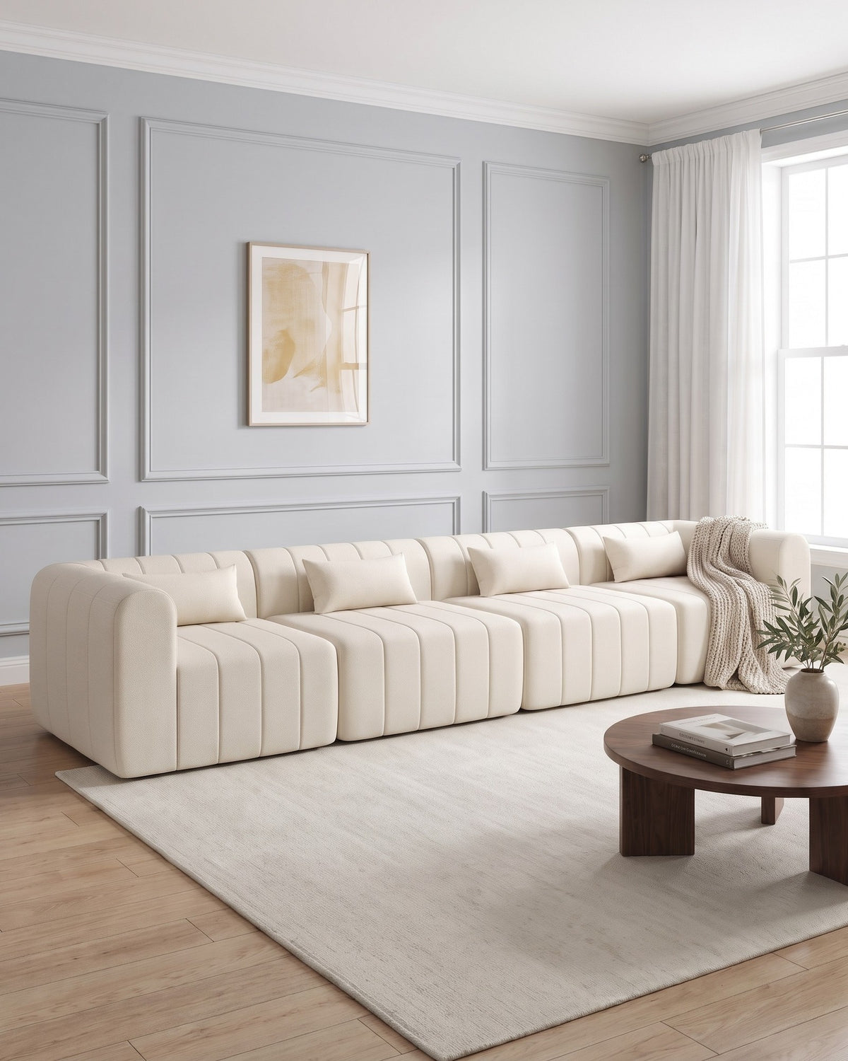 Compressed Modular Sectional, 145 in in Beige, styled in a bright living room