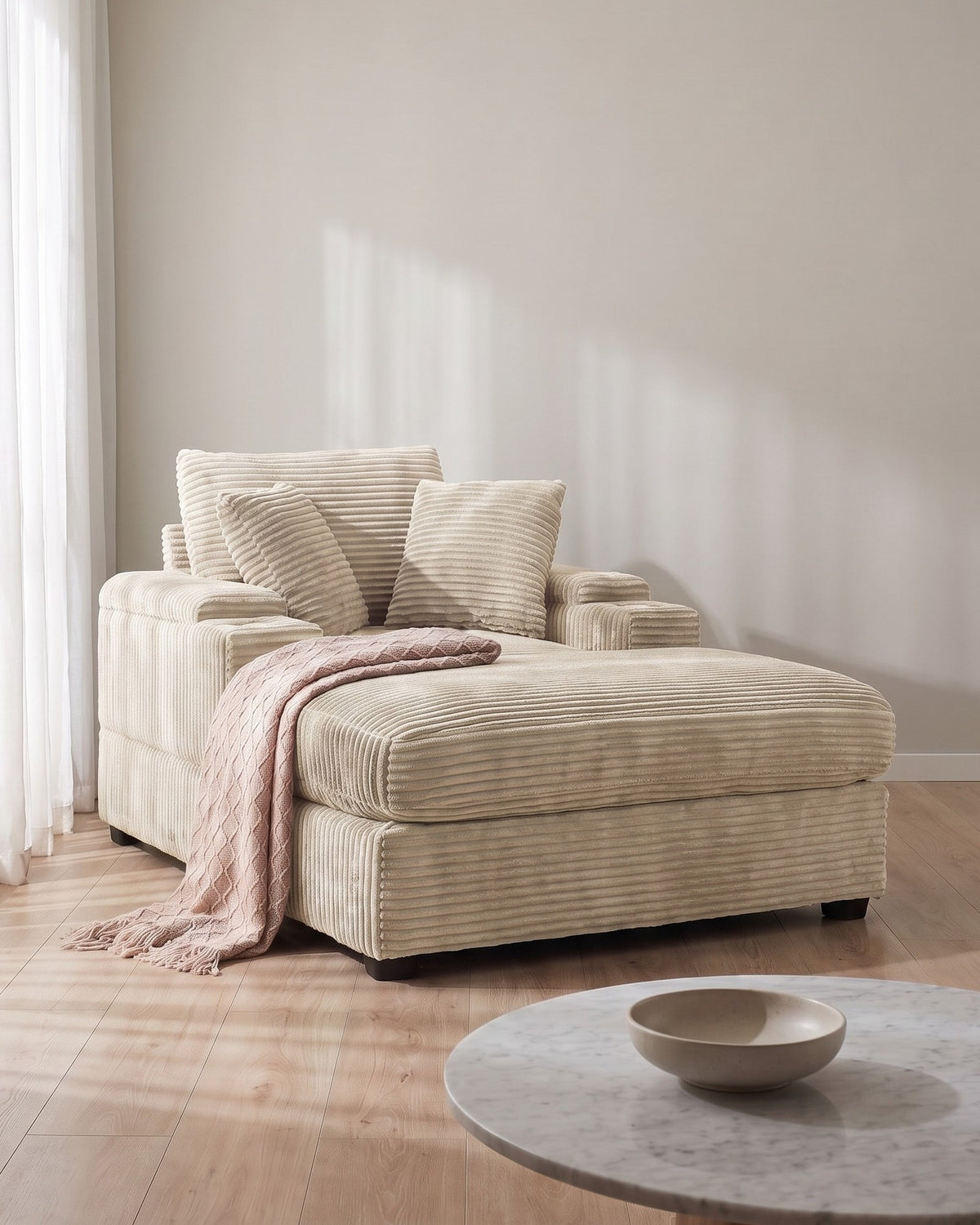 Corduroy Chair and a Half with Storage Arms and Ottoman in Beige, styled in a bright living room