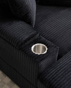 Corduroy Chair and a Half with Storage Arms and Ottoman in Black, fabric close-up [c:black]