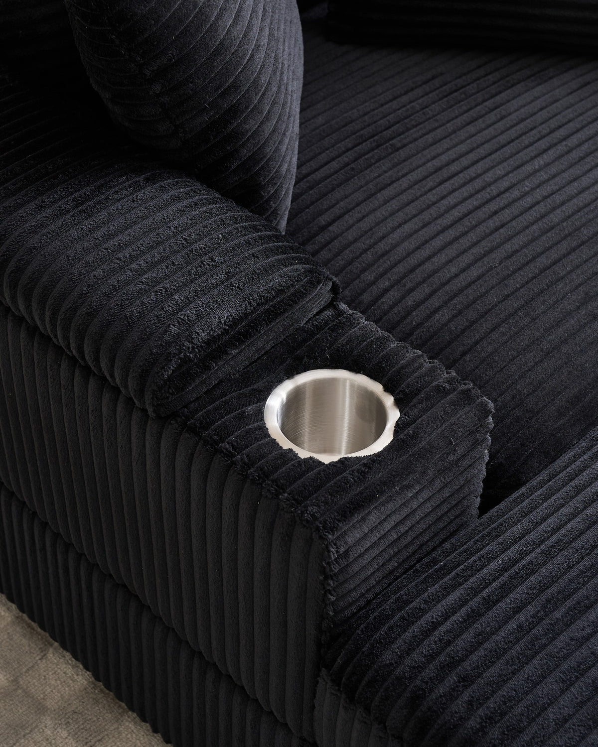 Corduroy Chair and a Half with Storage Arms and Ottoman in Black, fabric close-up