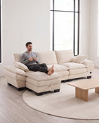 Corduroy Cloud Sectional with 2 Storage Ottomans, 102 in in Beige, with a person relaxing on it [c:beige] [r:comfort]
