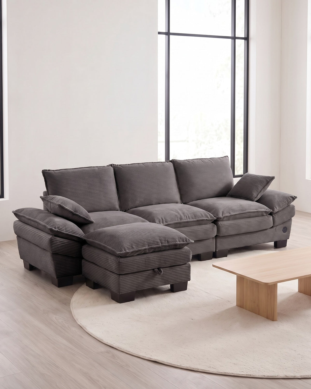 Corduroy Cloud Sectional with 2 Storage Ottomans, 102 in in Dark Grey, styled in a bright living room