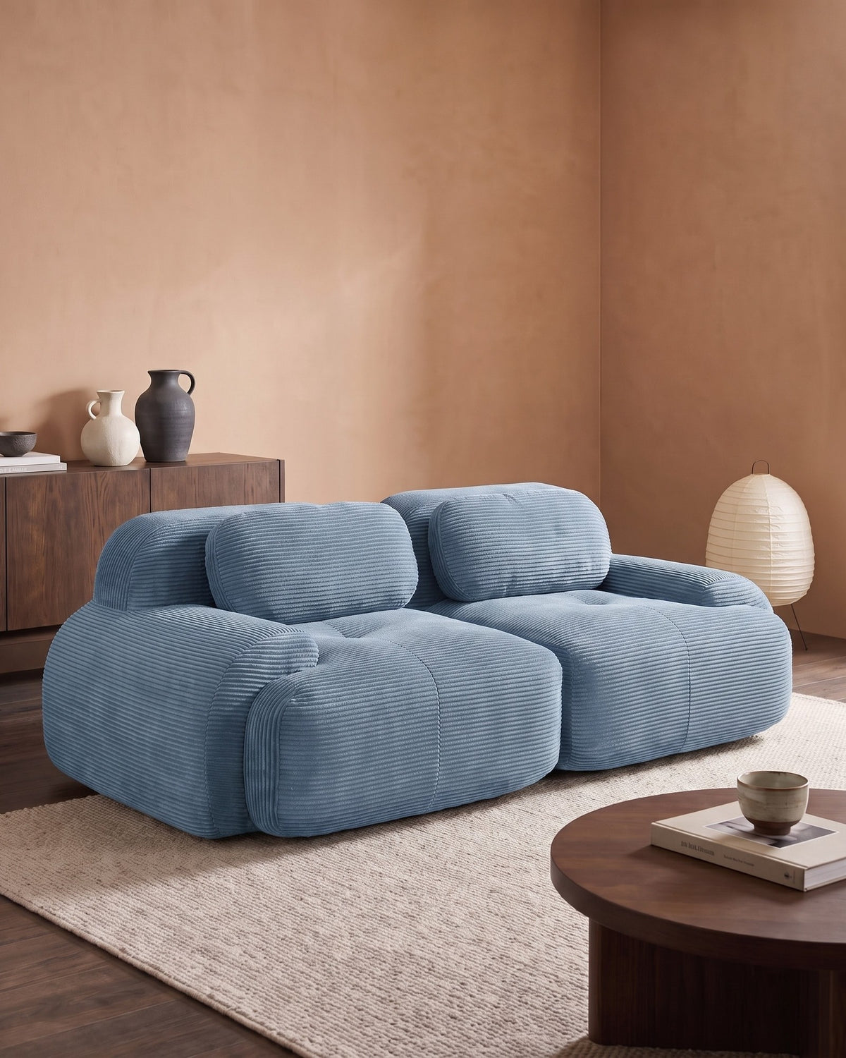 Corduroy Modular Loveseat, 82 in in Blue, styled in a bright living room
