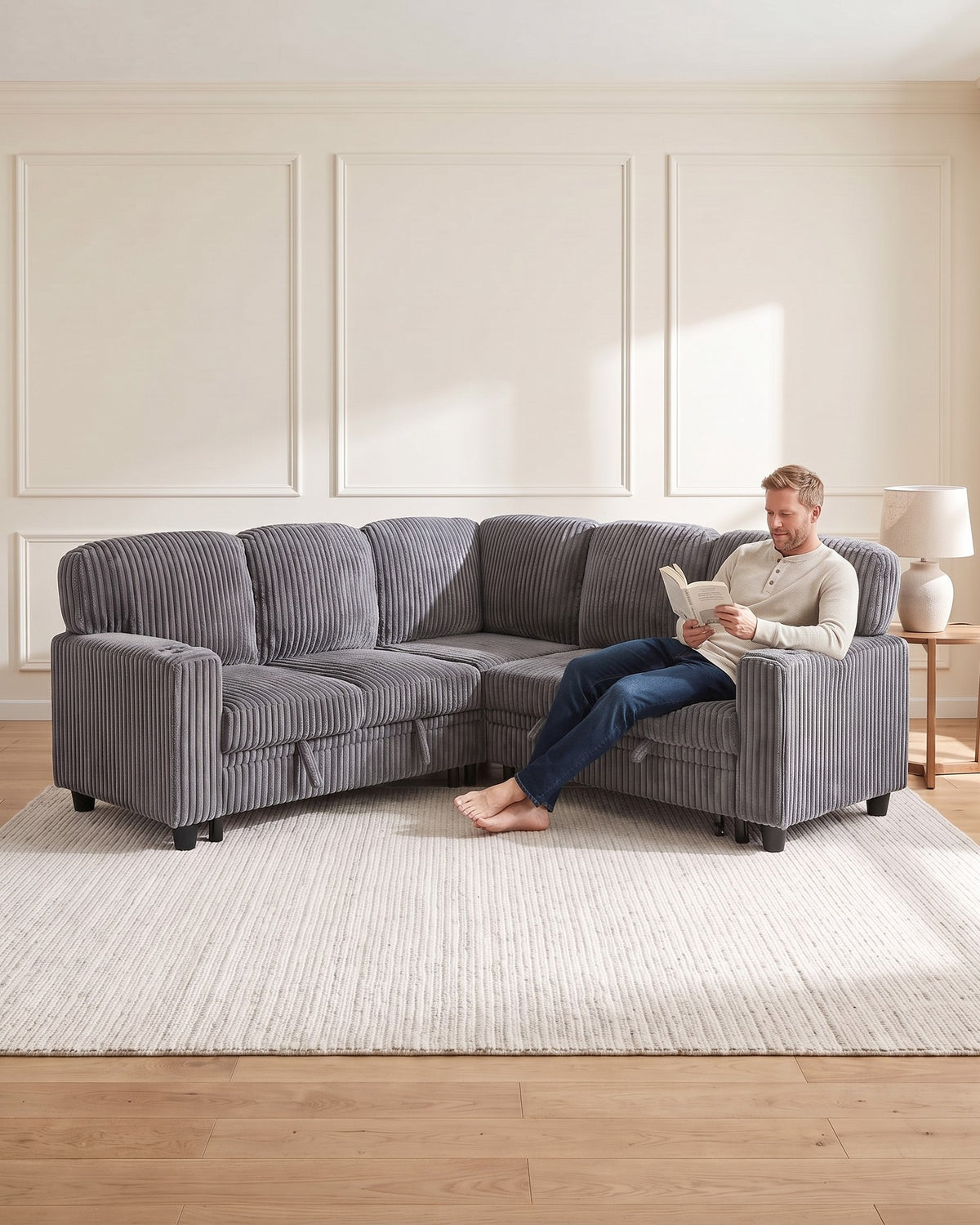 Corduroy Sleeper Sectional with Pull-Out Bed and Storage, 81 in in Grey, with a person relaxing on it
