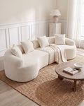 Curved Boneless Sofa, 110 in in White, styled in a bright living room [c:white] [r:good]