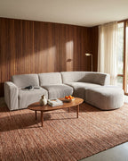 Curved Deep-Seat Sectional with Ottoman, 111 in in Espresso, styled in a bright living room [c:espresso] [r:good]