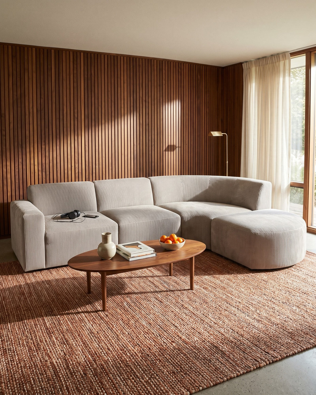 Curved Deep-Seat Sectional with Ottoman, 111 in in Espresso, styled in a bright living room