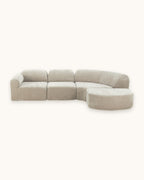 Curved Deep-Seat Sectional with Ottoman, 111 in in Espresso, studio photo on a light background [c:espresso] [pack]