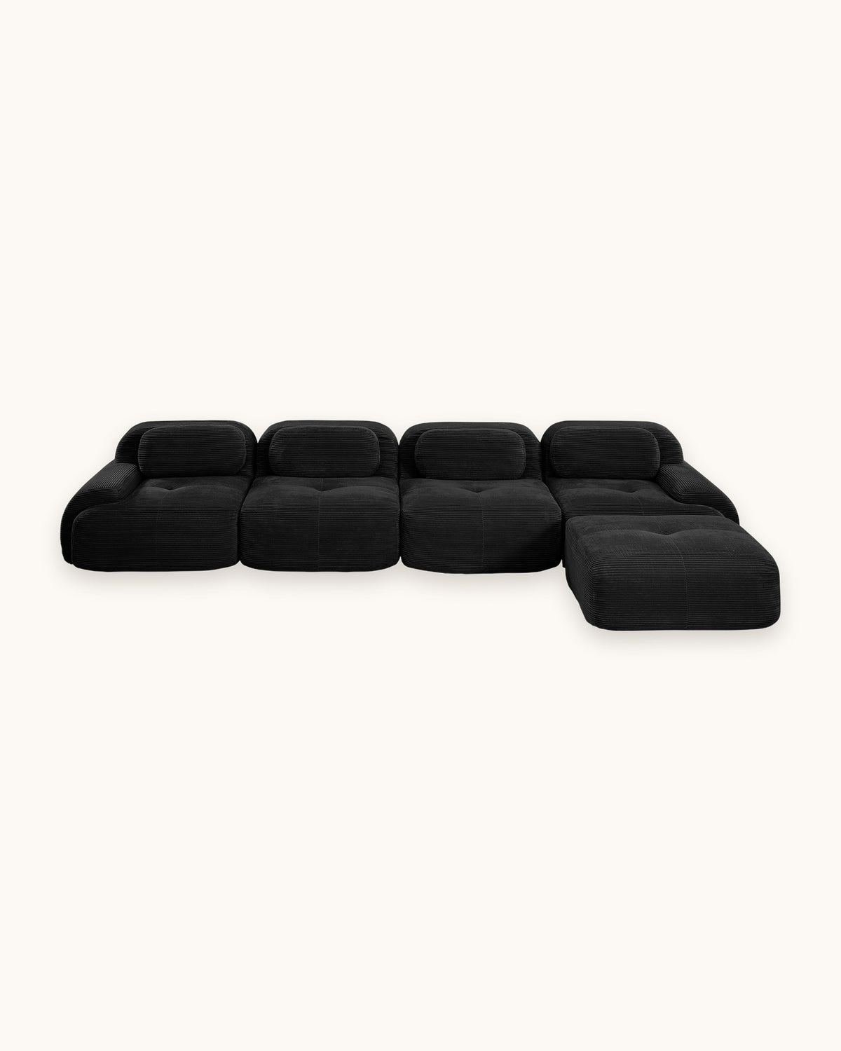 Modular Sofa with Reversible Ottoman, 4 Seats in Black, studio photo on a light background