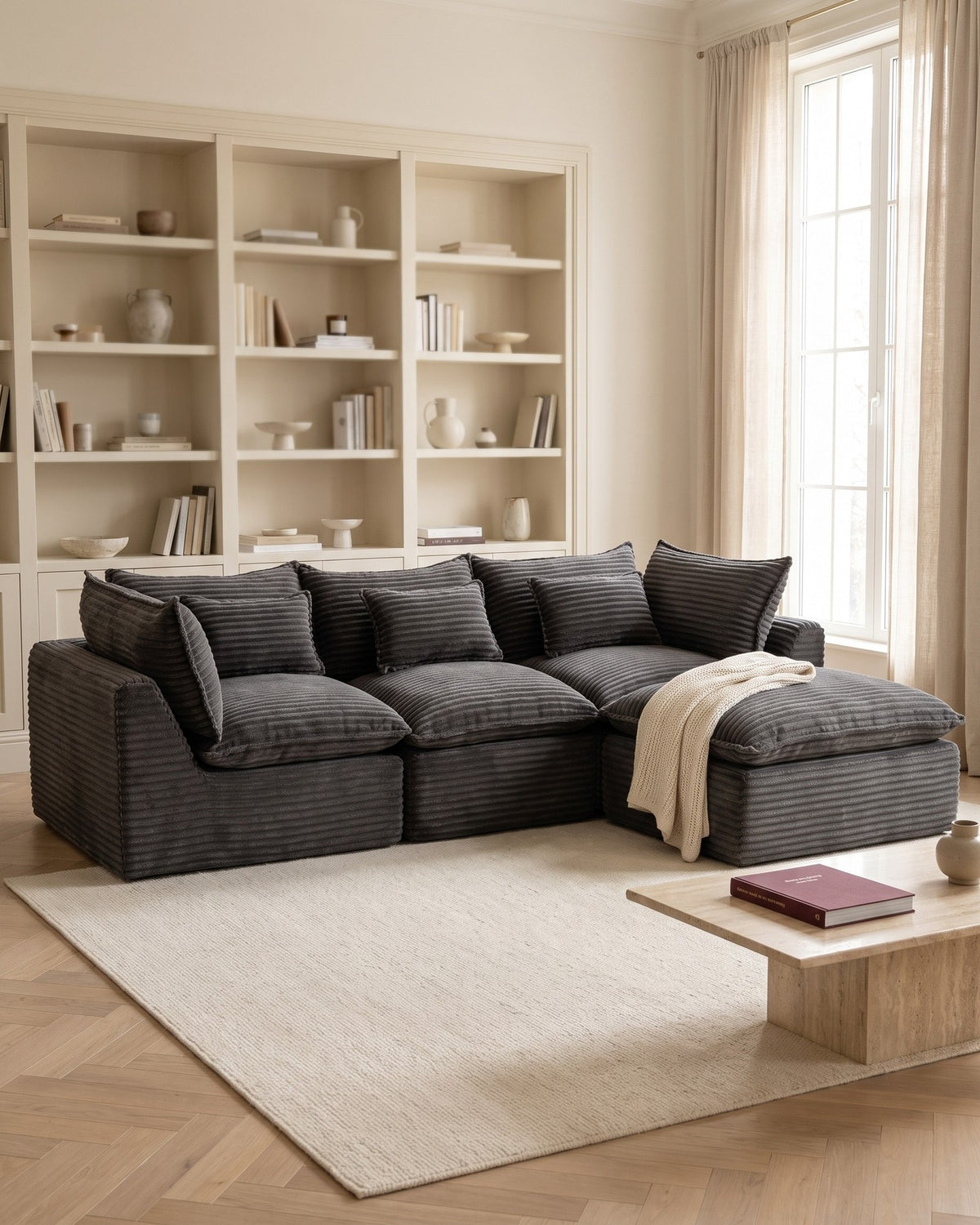 Oversized Cloud L-Shaped Sectional, 102 in in Antique Grey, styled in a bright living room