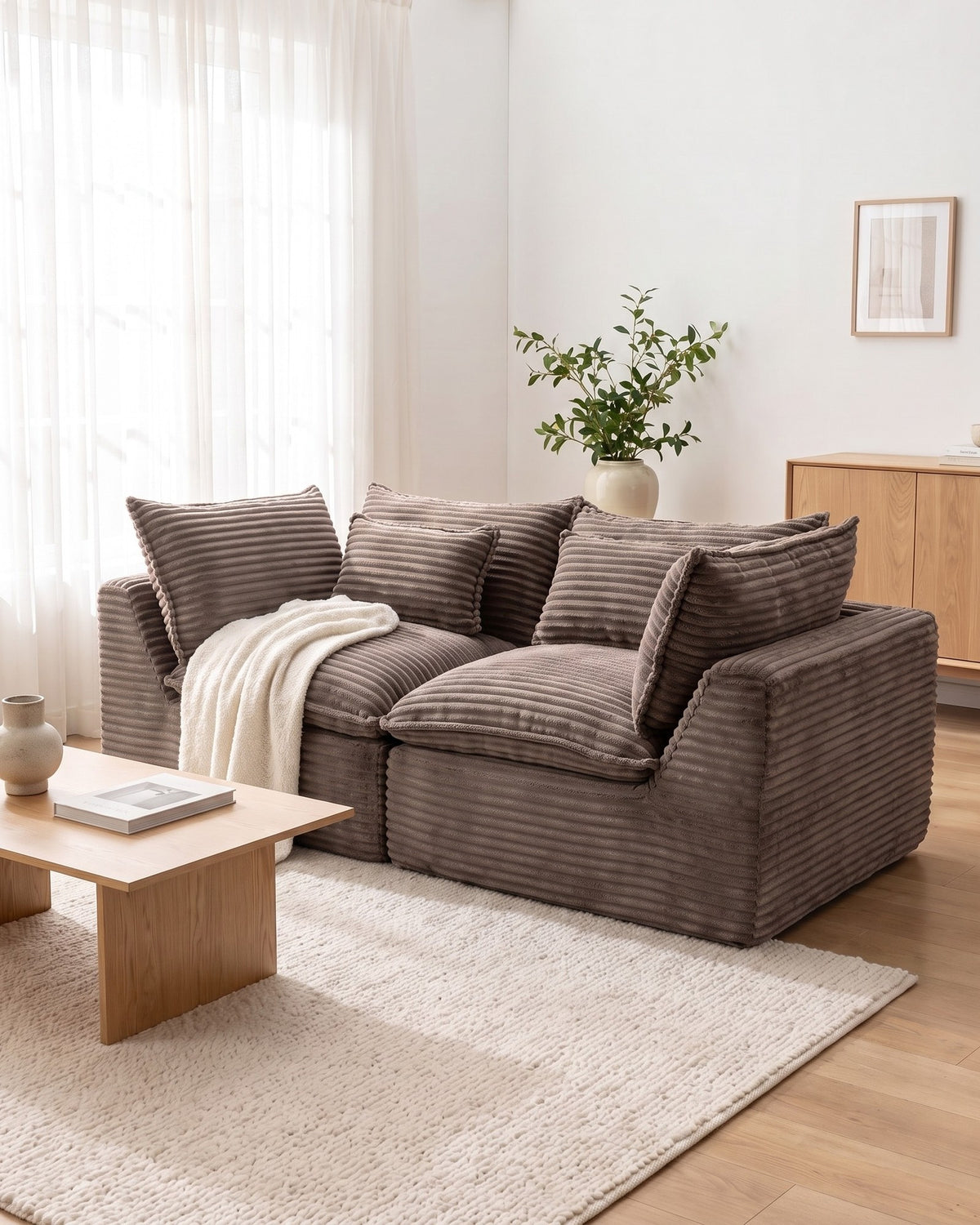 Oversized Cloud Loveseat, 75 in in Taupe, styled in a bright living room