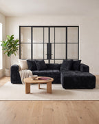 Textured Cloud L-Shaped Sectional with Chaise, 108 in in Black, styled in a bright living room [c:black] [r:good]