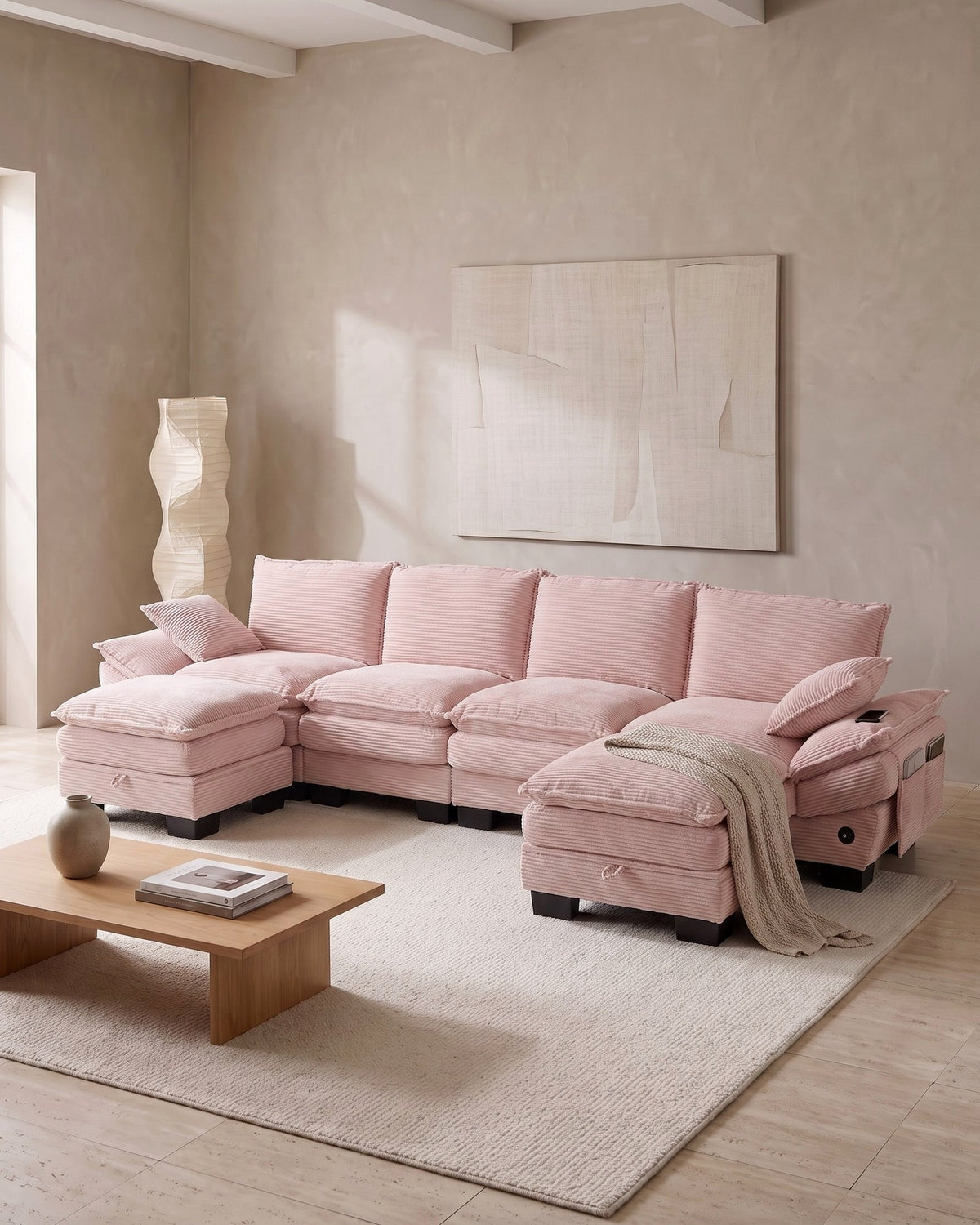 U-Shaped Corduroy Cloud Sectional with 2 Storage Ottomans, 130 in in Pink, styled in a bright living room
