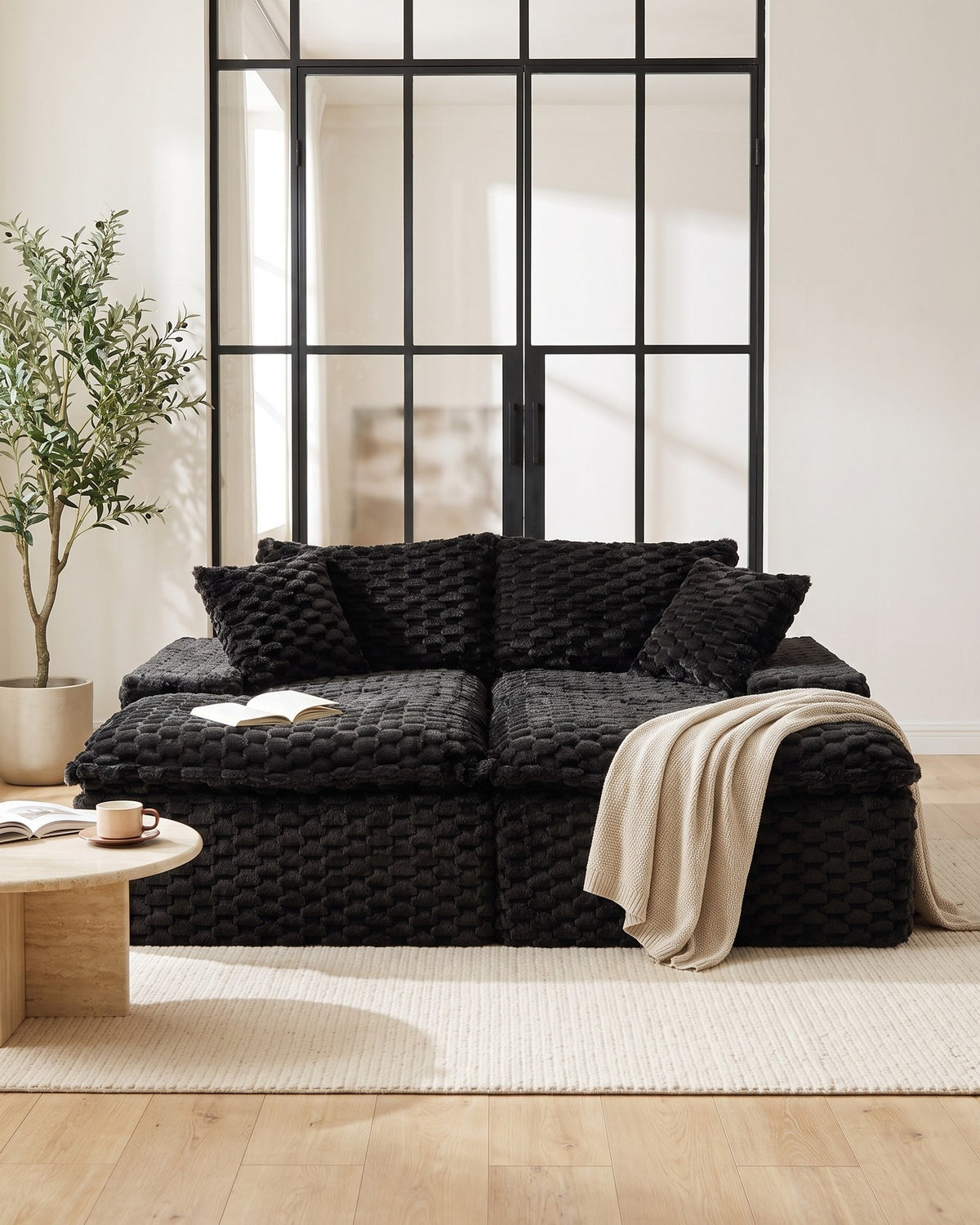 Velvet Double Chaise Lounge Sofa, 72 in in Black, styled in a bright living room