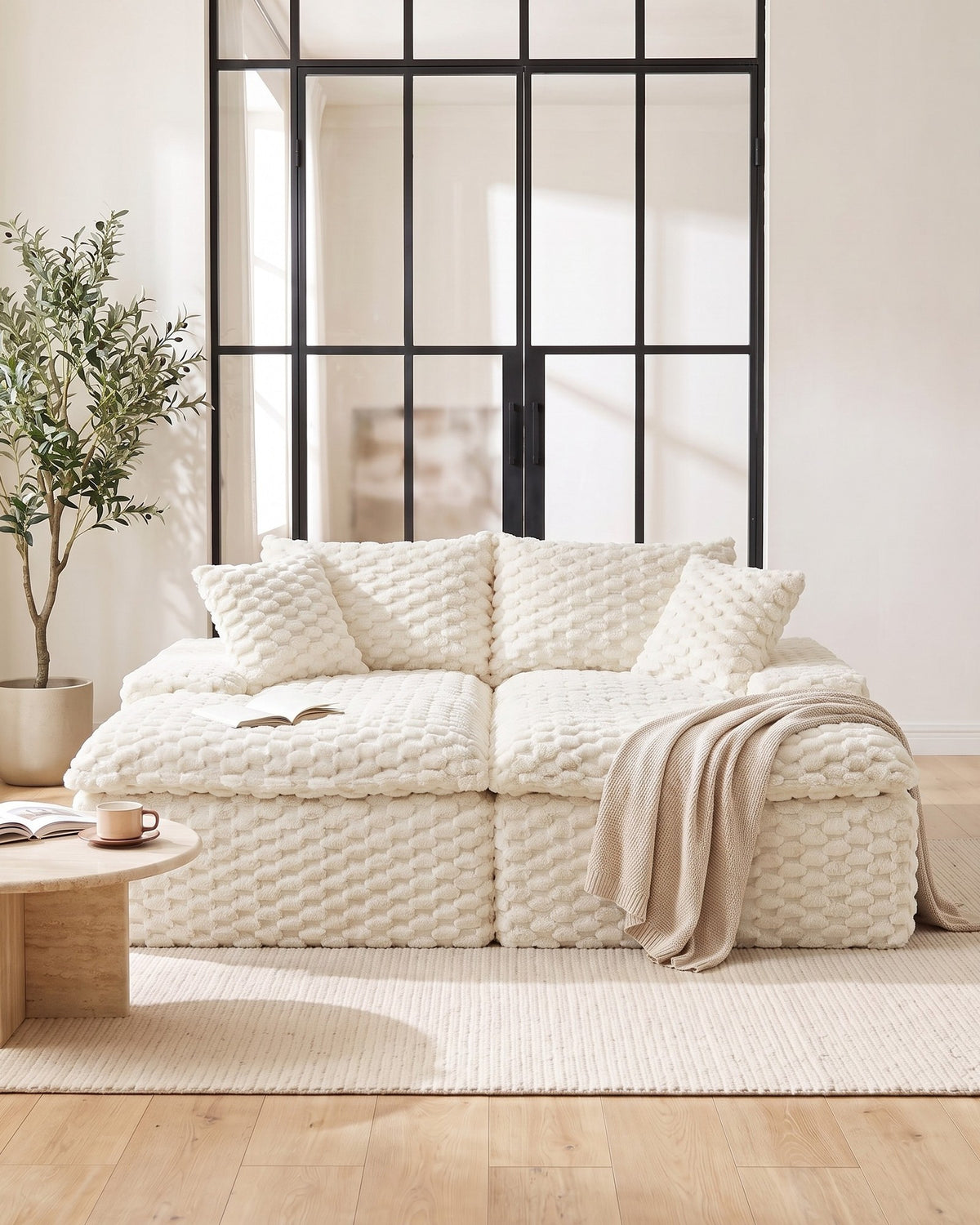 Velvet Double Chaise Lounge Sofa, 72 in in White, styled in a bright living room