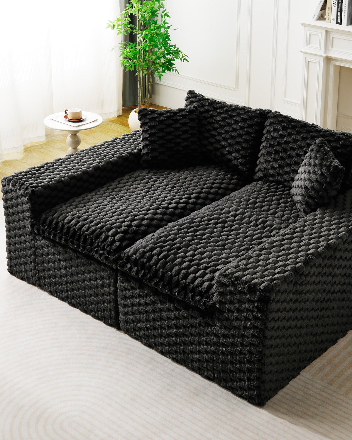Velvet Modular Sofa, 4 Seats, 120 in in Black, two sections pushed together into a daybed