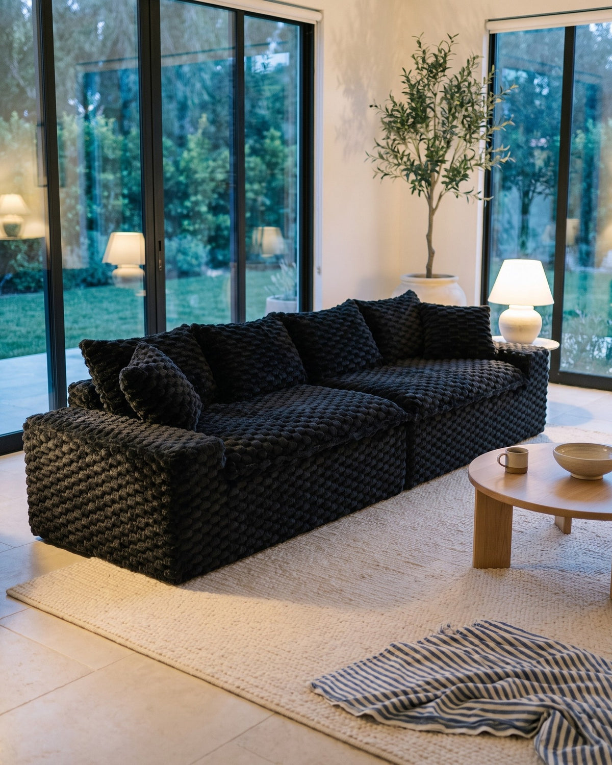 Velvet Modular Sofa, 4 Seats, 120 in in Black, styled in a bright living room